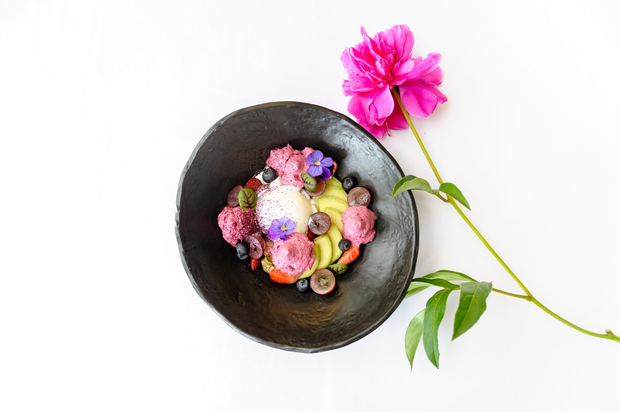 Tasting menu course with edible flowers